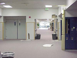 Columbine High School east entry, badly damaged by bullets