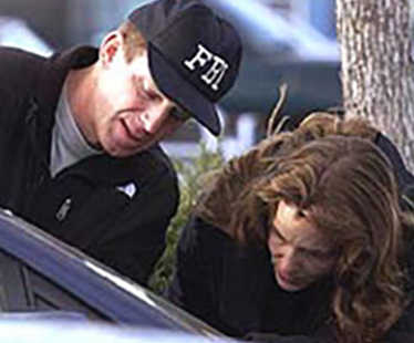 FBI investigate cars in Columbine's parking lot