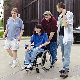 Richard Castaldo in Bowling for Columbine, along with Michael Moore, Mark Taylor, and Brooks Brown