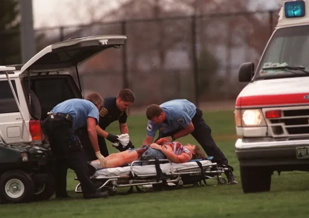 First responders put Columbine victim on stretcher First responders put Columbine victim on stretcher