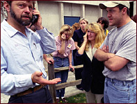 Bill, Lorie, Jason, Kendra, and Kami Curry wait to find out information about the Columbine shootings and their family who were trapped inside the school
