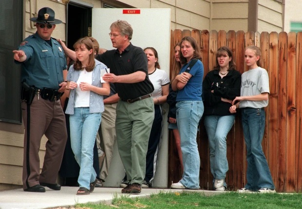 Columbine survivors are rounded up from hiding